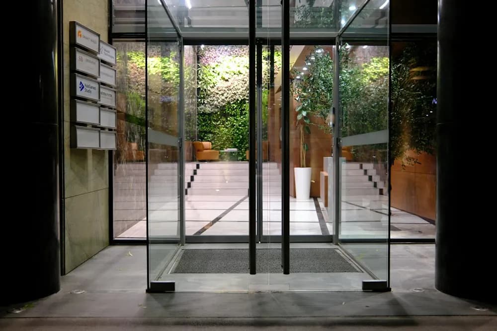 Glass office entrance at street level