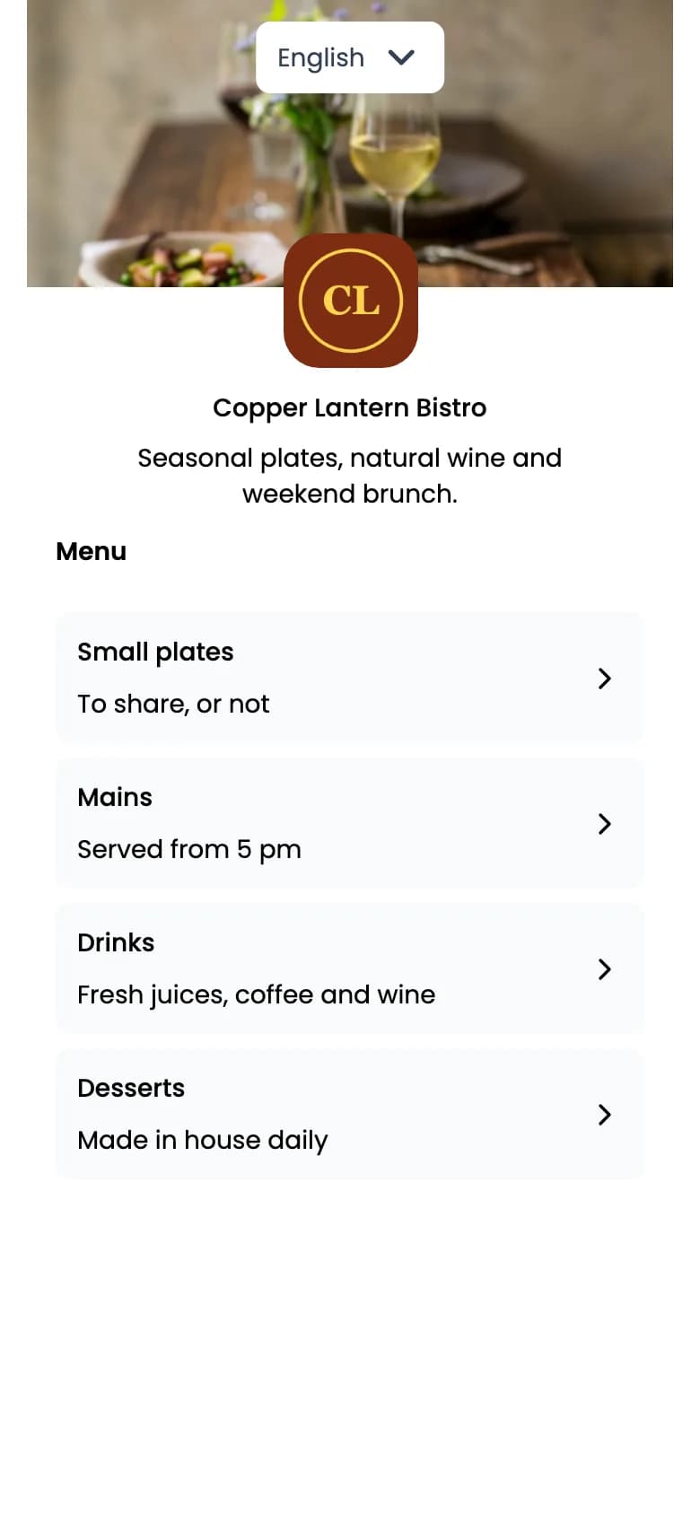 QR Rapid menu page for a sample bistro: a cover photo with an English language dropdown, the Copper Lantern Bistro logo and name, and four sections: Small plates, Mains, Drinks and Desserts.