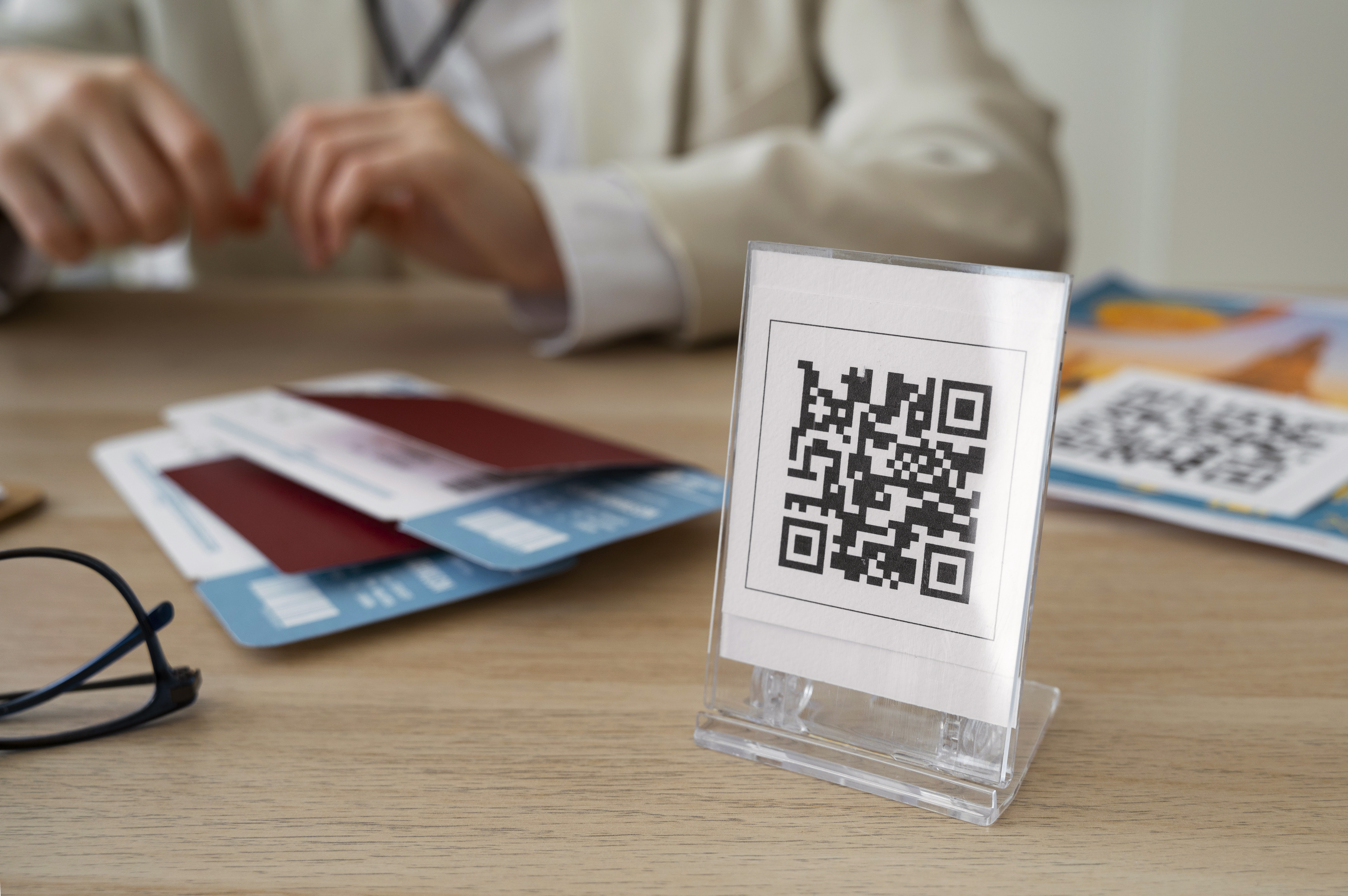Professional woman accessing workplace documents through QR code scanning for enhanced office productivity